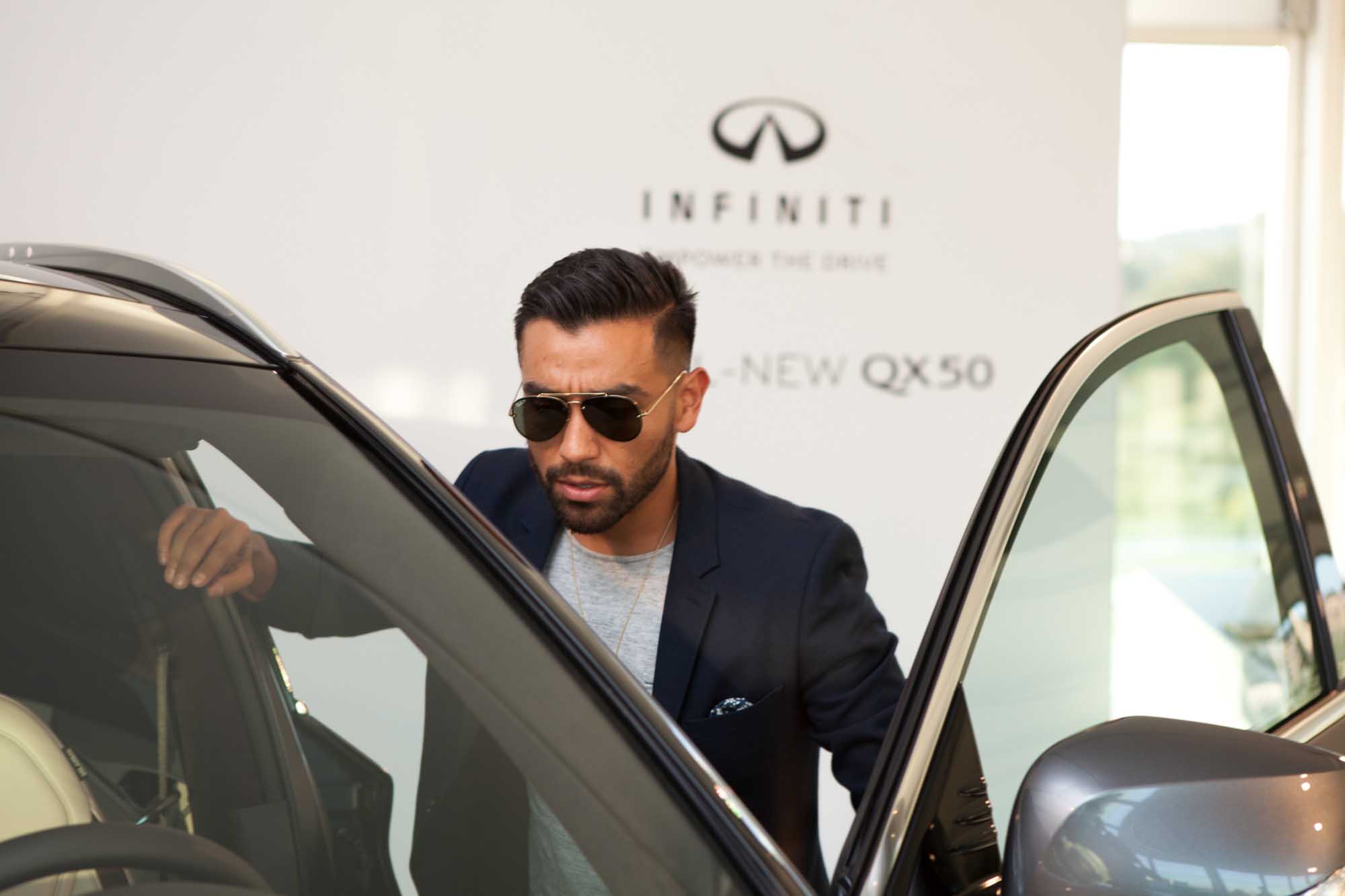 J Fig - @rule_of_thumbs in front of Infiniti QX-50 |  Car Photography | Fashion Photography | Male Model