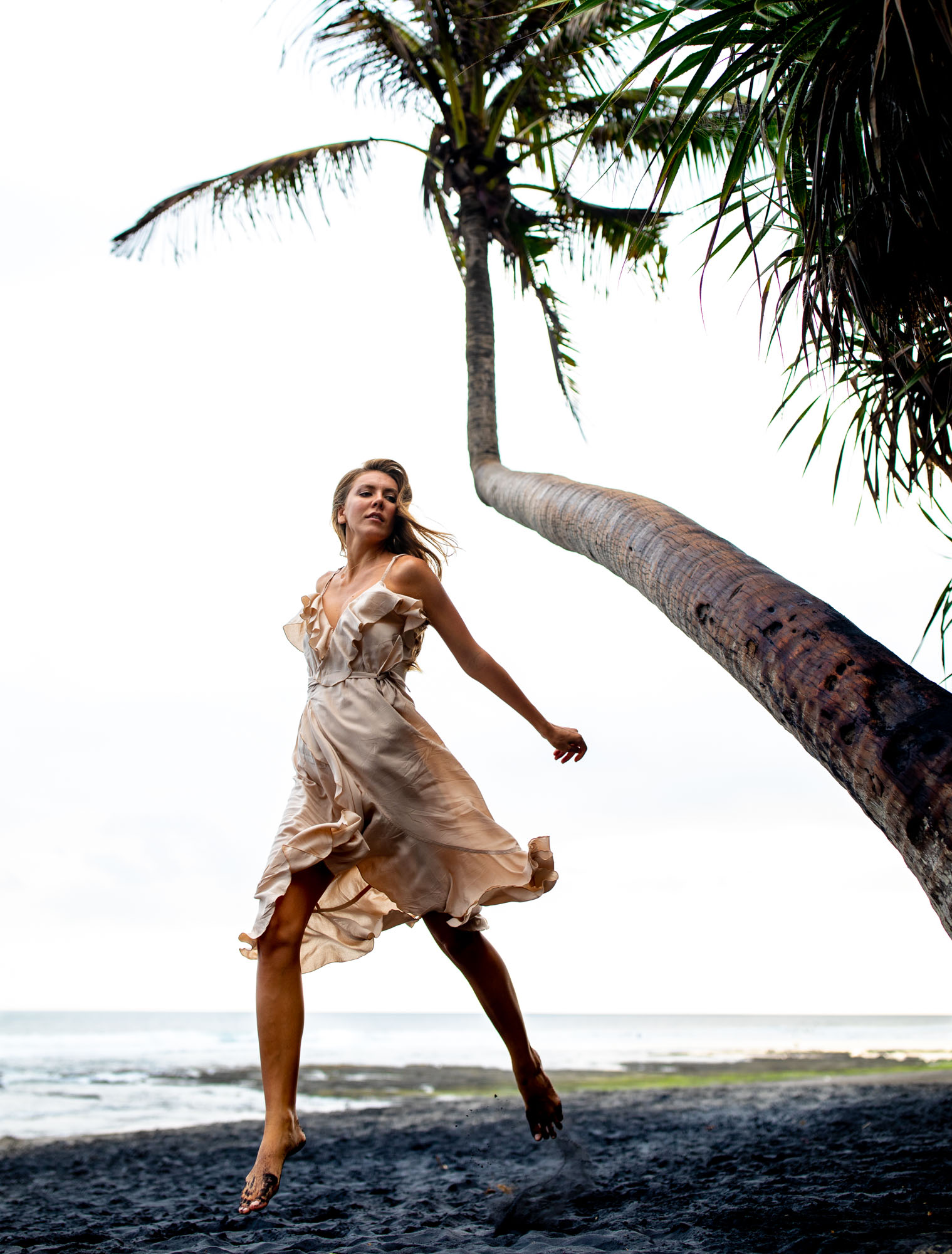 Woman jumping in flowing dress | Swimwear | Lifestyle Photography | Canggu, Bali, Indonesia