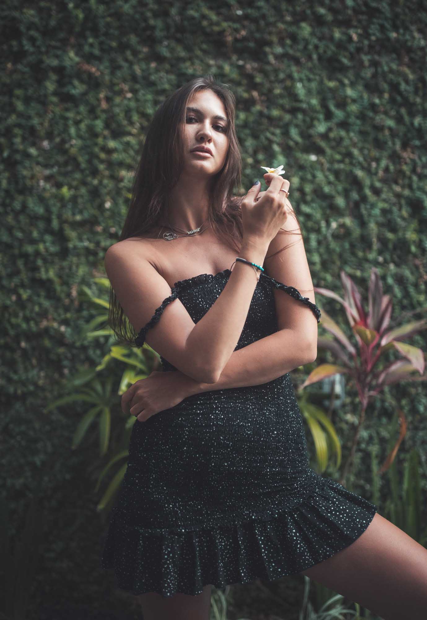 Woman in sexy black dress poses with a flower | Fashion Photography | Portrait | Lifestyle Photography | Canggu ,Bali, Indonesia | Sexy | Hot | Denver Photographer