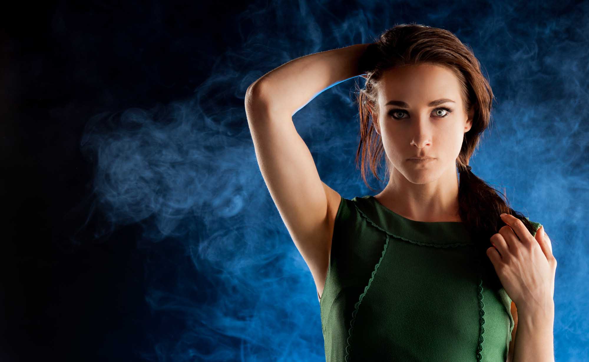 Portrait of model with dramatic lighting and smoke in background | Fashion Photography 