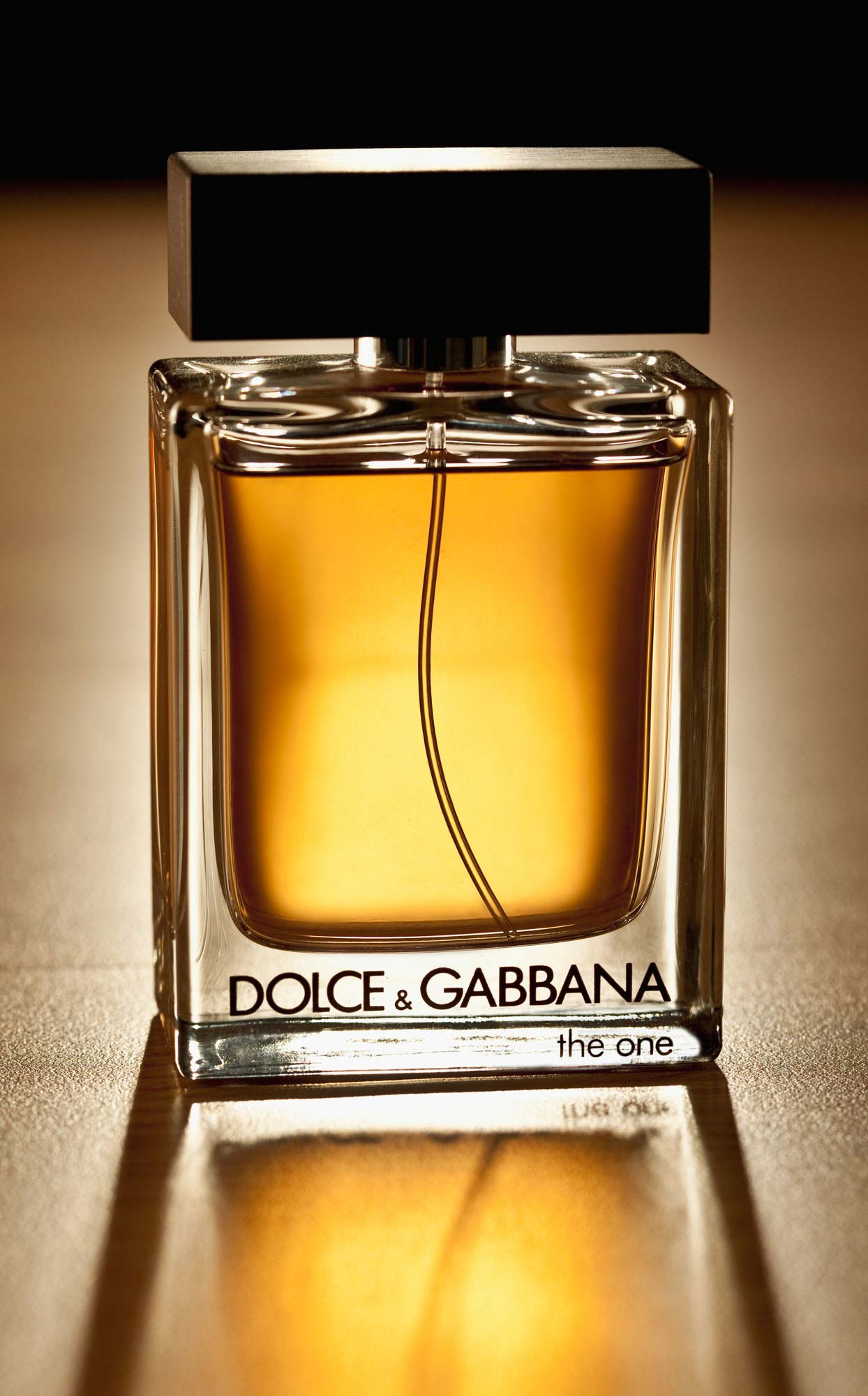 Dolce & Gabbana Cologne on wood table, product photography with dramatic lighting  | Still Life Photography | Shot in Denver, Colorado